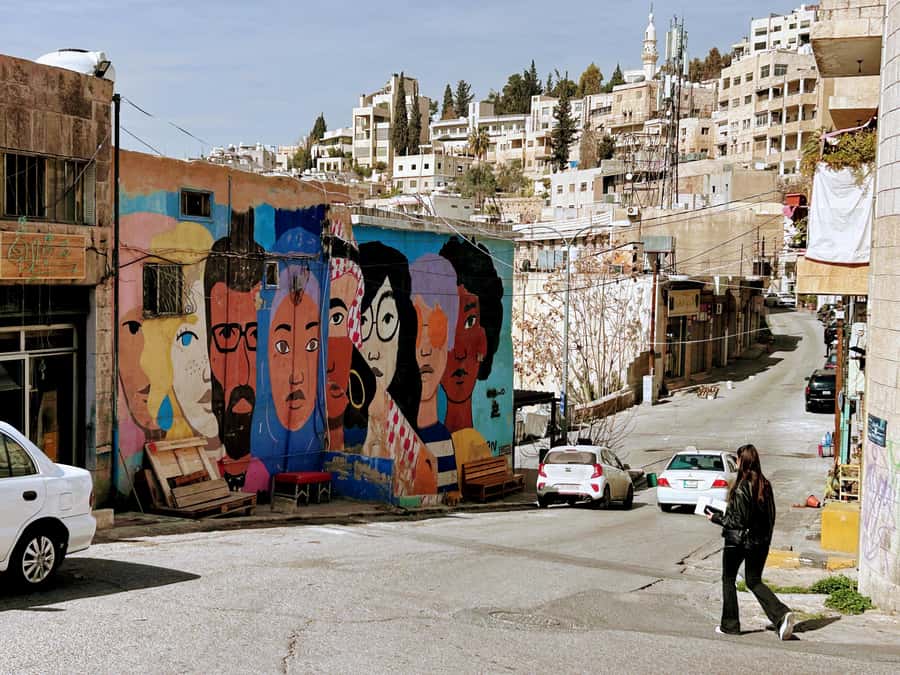 Amman Walking Tour: Hidden Gems, Culture & Street Food - Roman Theatre and the ancient layer below the streets