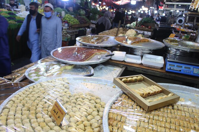 Day or Night Walking Tour in Downtown With Local - Basman Street and the working souks