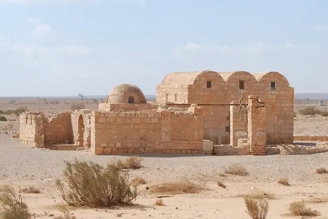Day Tour To Desert Castles & Cave of the Seven Sleepers - Qsar Al-Azraq: a black basalt fort with Lawrence connections