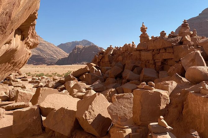 Discover Wadi Rum by 4x4 with a Bedouin guide - Climbing Al Ramal’s red sand dune