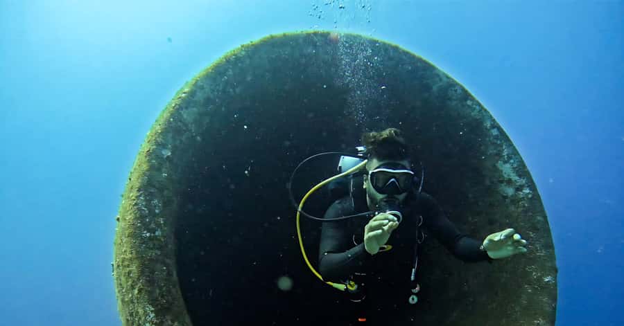 Explore Aqaba's Depths: Scuba Diving Tour, with Hotel Pickup - Coral reef or wreck site: choosing the right mood