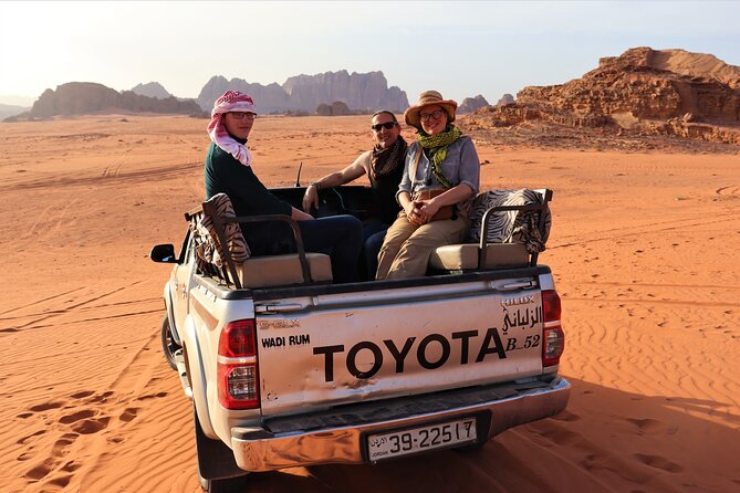 Full Day 4x4 Classic Desert Tour with overnight in private tent - Open-back 4x4 travel across the desert
