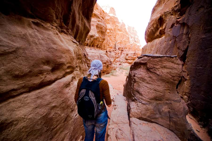Wadi Rum: Explore 10-Hour Jeep Tour Pass, Guide, Meal & Stay - Riding through the red desert in an open jeep