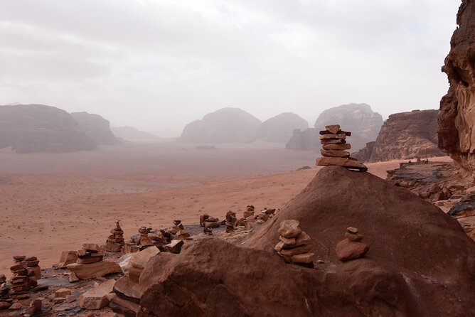 Wadi Rum: Explorer Jeep Tour PASS + Local Food + Optional Stay - Lawrence’s Spring and the first red views