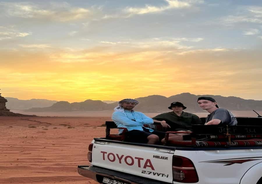 Wadi Rum:Full Day Tour Lunch Sand boarding Camel Ride Sunset - Khazali Canyon and ancient inscriptions