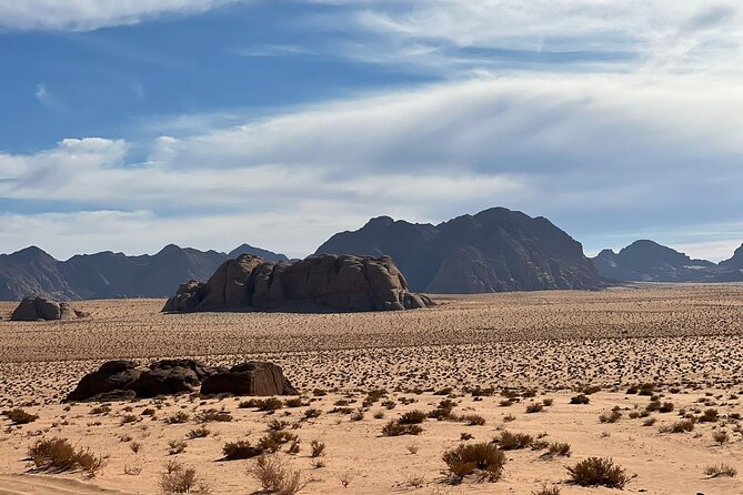 Wadi Rum Half-Day 4x4 and Camel Tour - Khazali Canyon and its ancient carvings